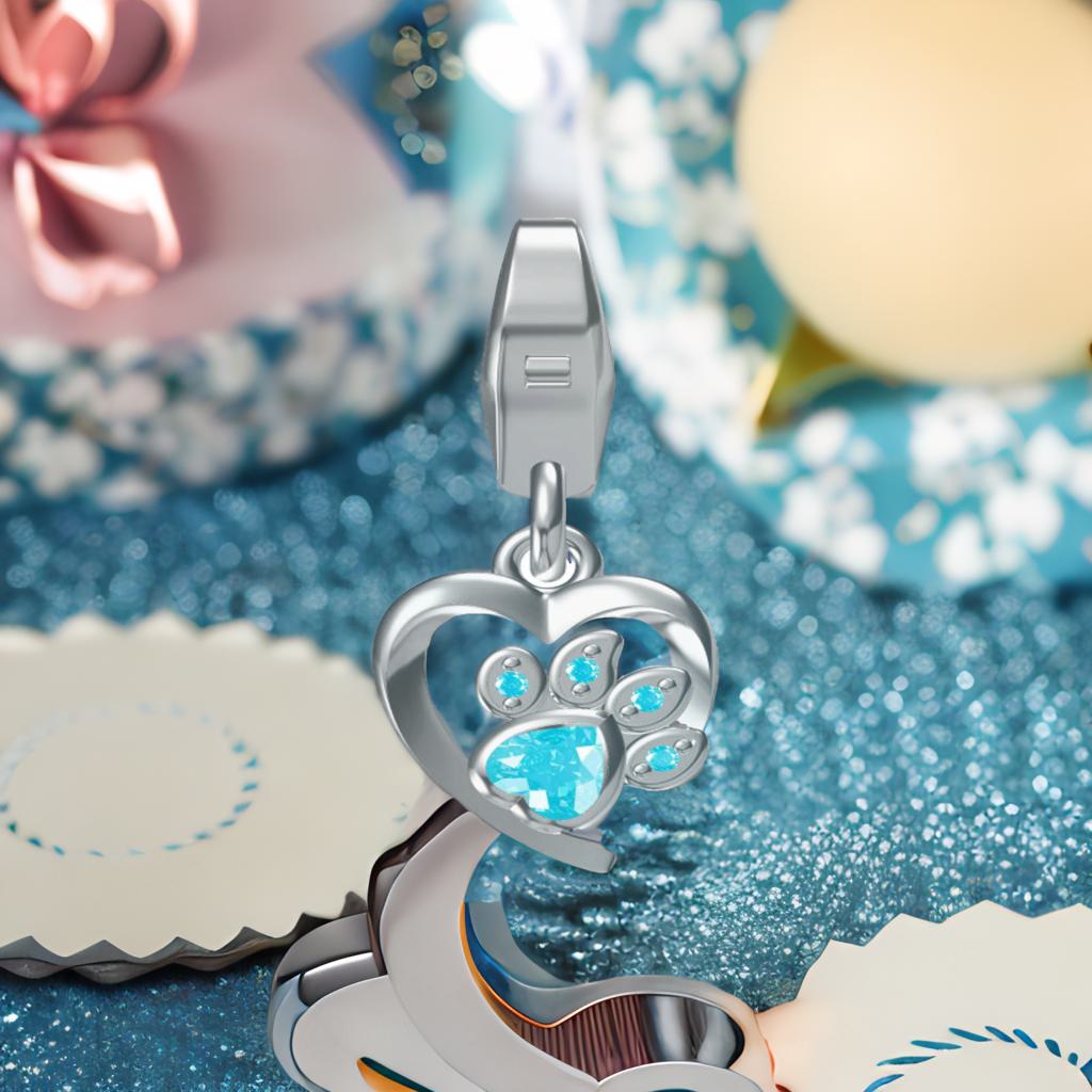 Charms Anhänger Pfote Zirkonia blau 925 Silber