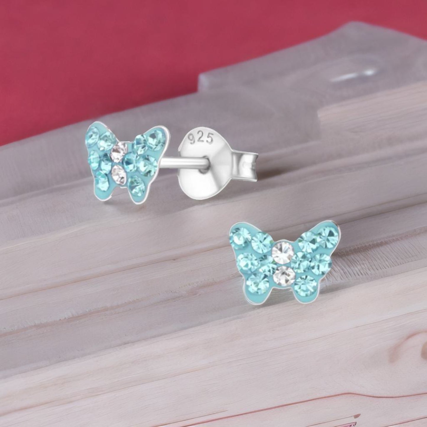 Kinderohrringe hellblauer Schmetterling 925 Silber aus Kristallen
